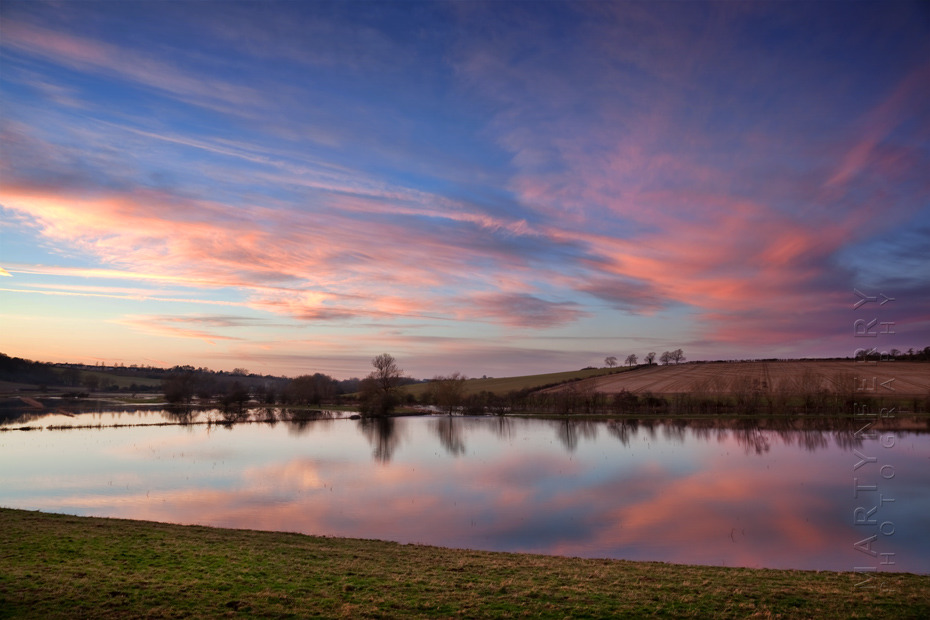 Photograph of the flooded Windrush Valley in the Cotswolds at sunset