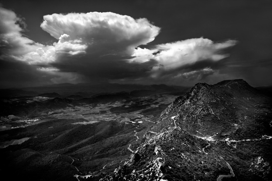 View out from Chateau de Quribus to dramatic clouds
