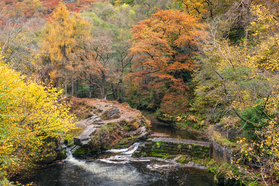 Autumn colour over an abandoned mine works in Wales