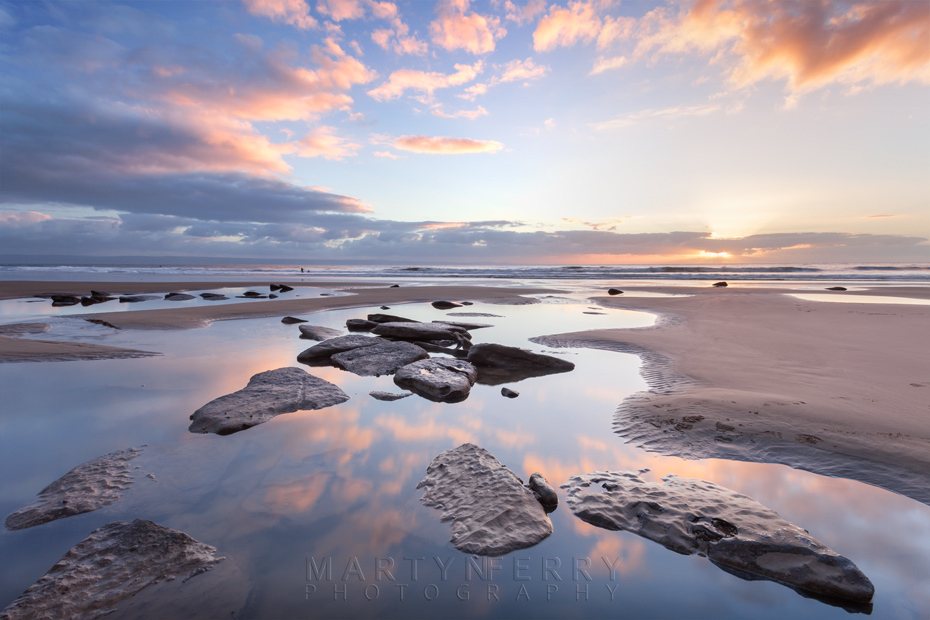 Beach landscape at sunset on Dunraven Bay in Wales