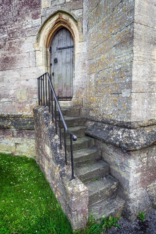 Ancient door at St. Mary's Church in the Cotswold town of Painswick