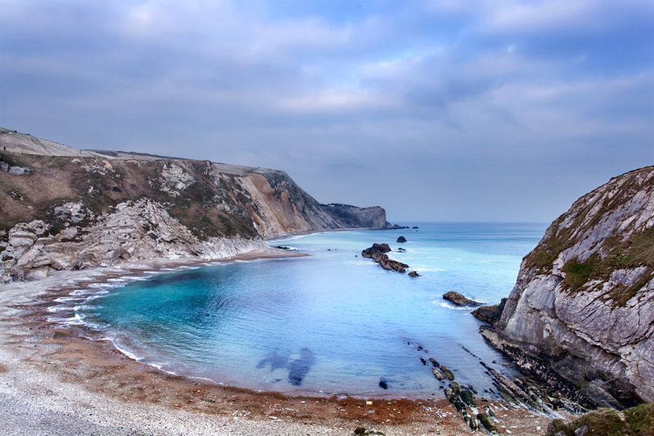 Blue waters at Man O'War Bay in Dorset