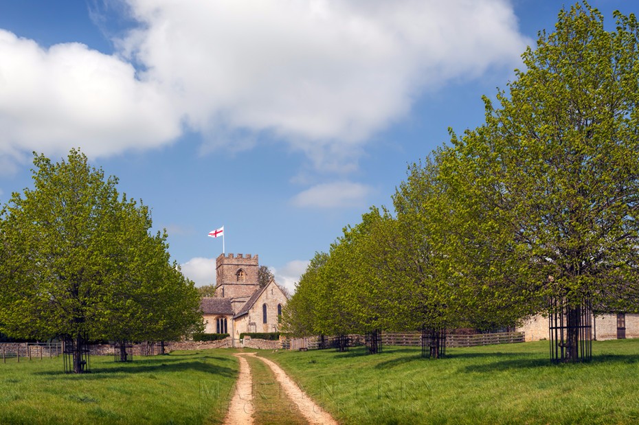 Guiting Power church with tree lined path