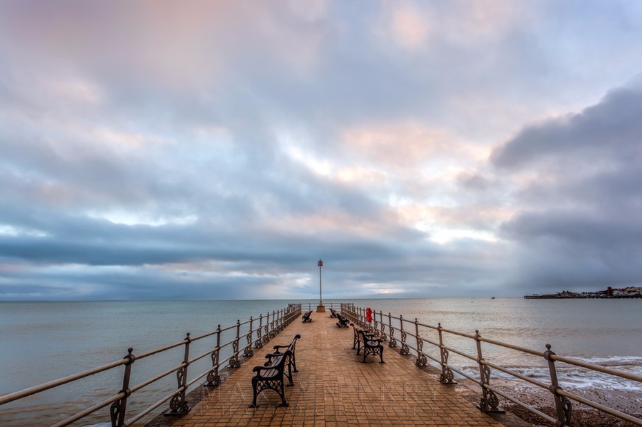 Sunrise over Banjo Pier in Swanage on the Dorset coast
