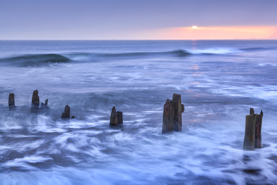 Beautiful sunrise photograph of Sandsend beach in North Yorkshire
