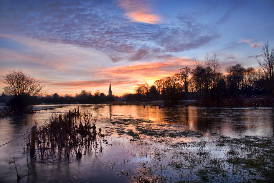 Landscape image of Burford in the Cotswolds under sunrise colours