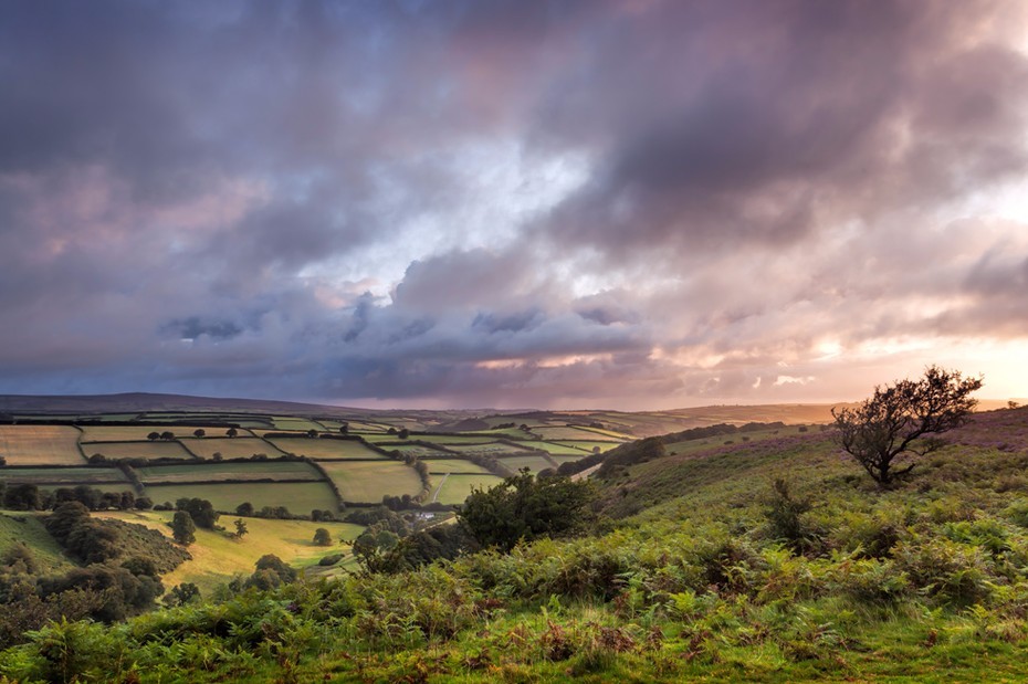 Sunrise clouds over the Punchbowl in Exmoor National Park