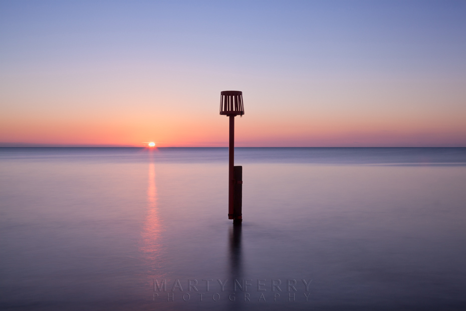 Sunrise over the ocean from the Swanage coastline