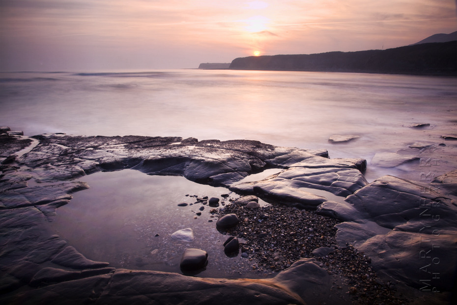 Warm sunset photo of rocks at Kimmeridge Bay