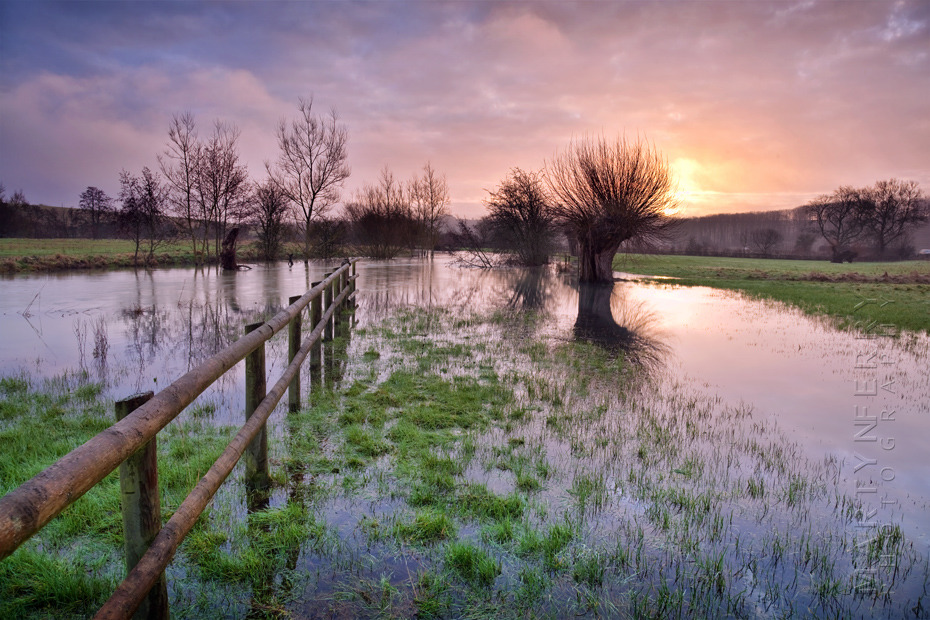 Beautiful photograph of a Cotswold sunrise over the River Windrush