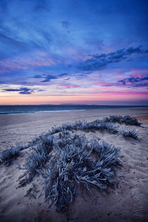 Sunset colours over an empty beach