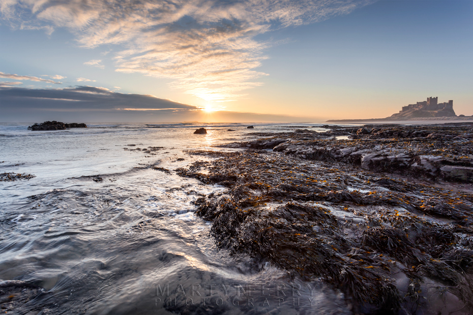 Sunrise over Bamburgh Castle in Northumberland