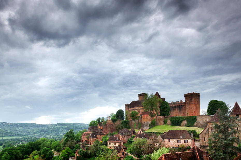Stormy image of the medieval village of Bretenoux in the Dordogne