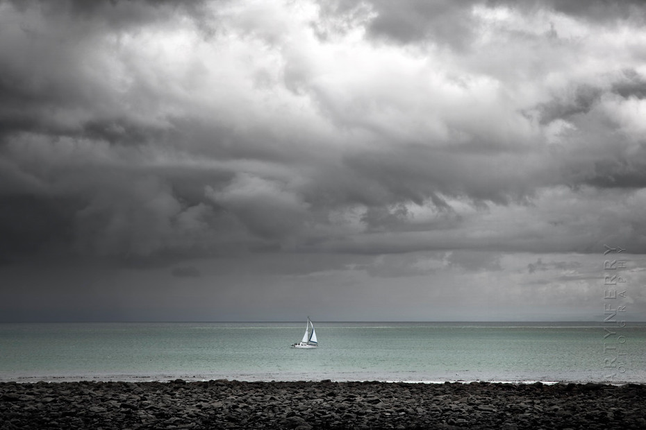 Incredible storm clouds over lone boat at Lynton