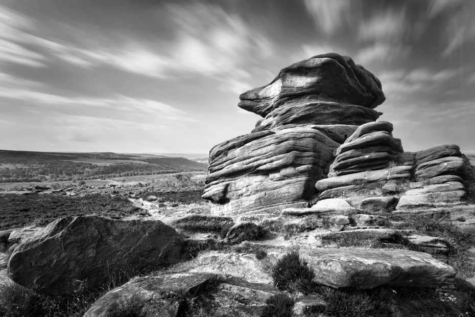 Black and white photograph of Mother Cap under clouds