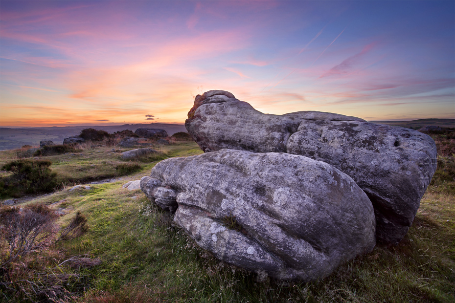 Beautiful sunset photo of rock at Baslow Edge