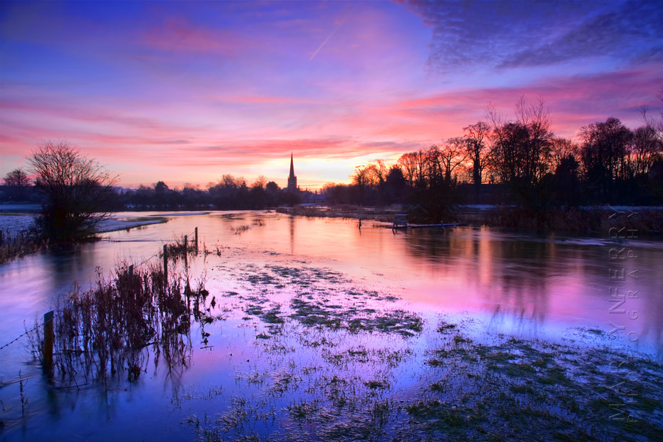 Stunning landscape photograph of Burford at sunrise