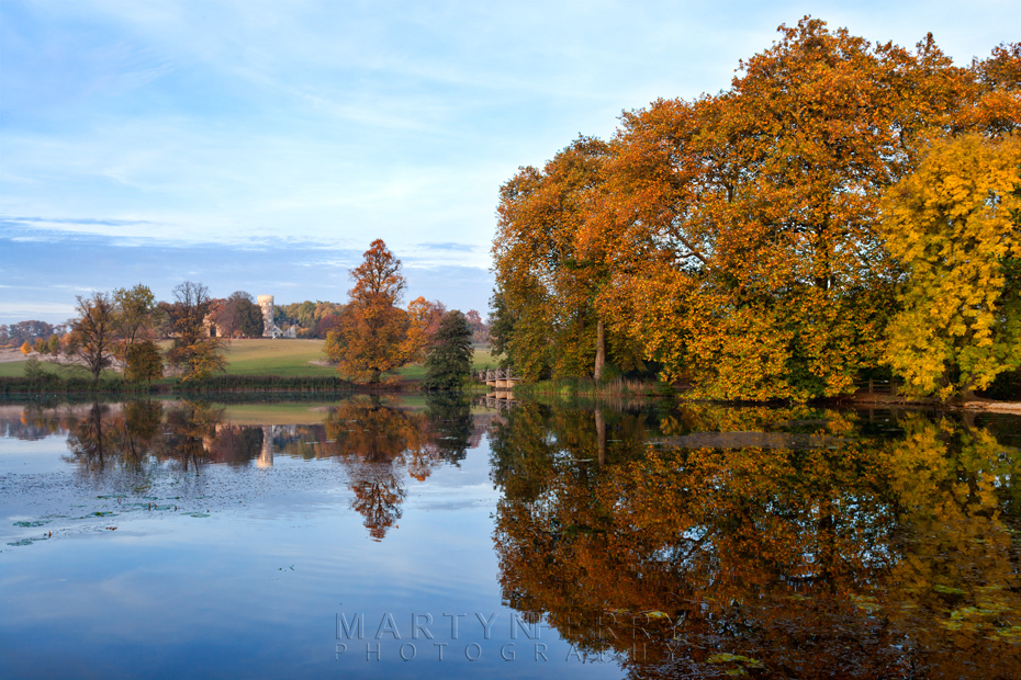 Autumn trees reflection at Wimpole Estate