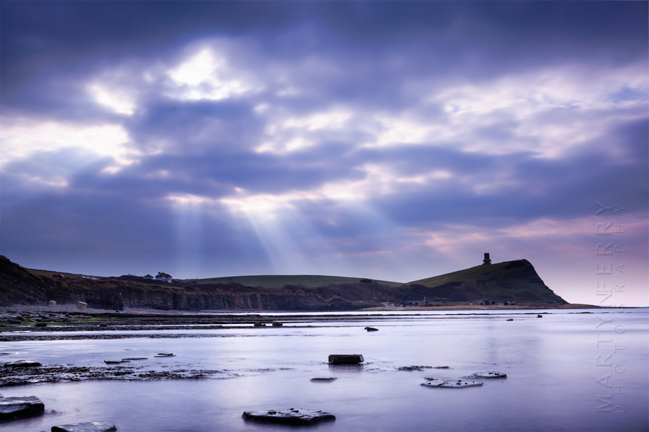 Sunbeams over the Dorset coast at Kimmeridge Bay
