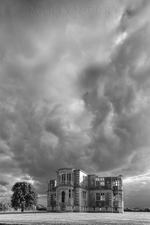 Liveden New Bield in monochrome under stormy skies