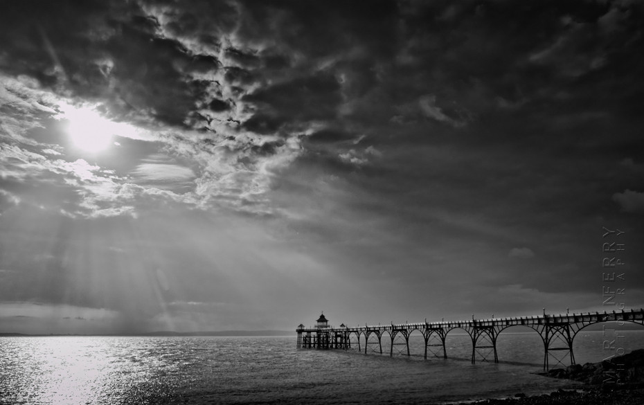 Stunning image of Clevedon pier in sunbeams