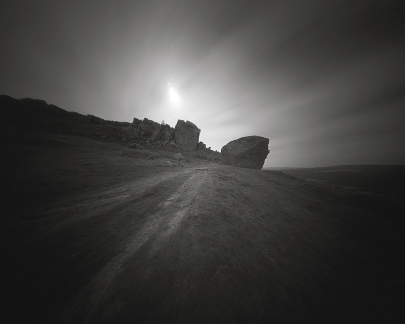 Black and White Image of the grassy path that leads to the Cow and Calf Rocks Ilkley