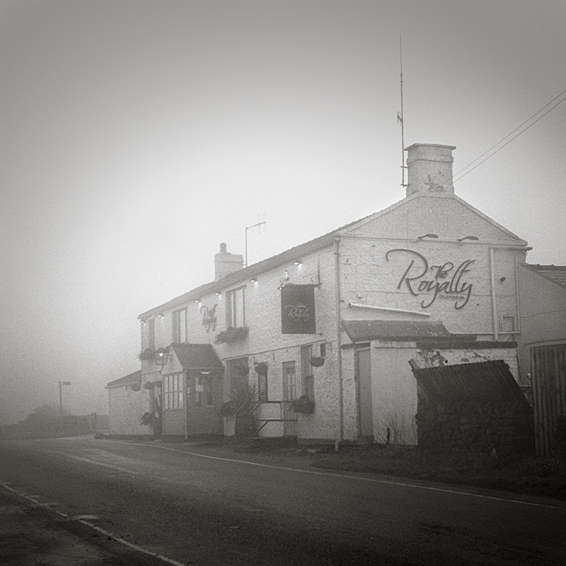 Black & White Photograph of Royalty Pub In the Mist - Architecture
