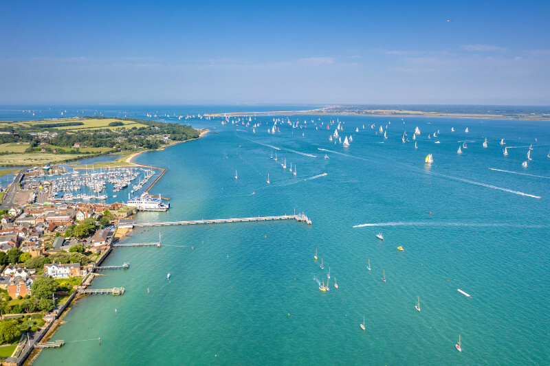 z3442 Round the Island Race overlooking Yarmouth - 'Aerial Visions Photography' showing the beautiful IOW from the air