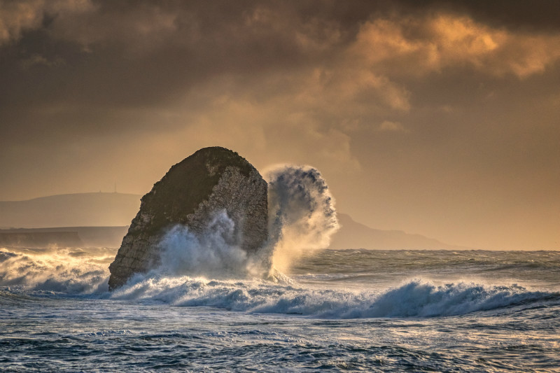 z3338 Breaking Surf over Stag Rock Freshwater Bay - Yarmouth to West Cowes inc Newtown