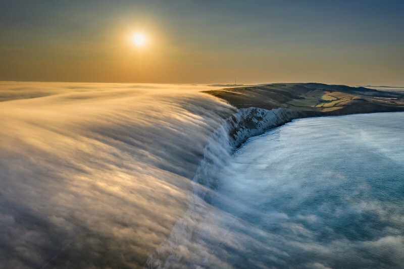 z3472 Flowing Fog abover Compton Bay - 'Aerial Visions Photography' showing the beautiful IOW from the air