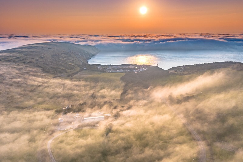 z4367 Evening light over Tennyson down and Alum bay - Freshwater Bay to Colwell Bay inc the Needles