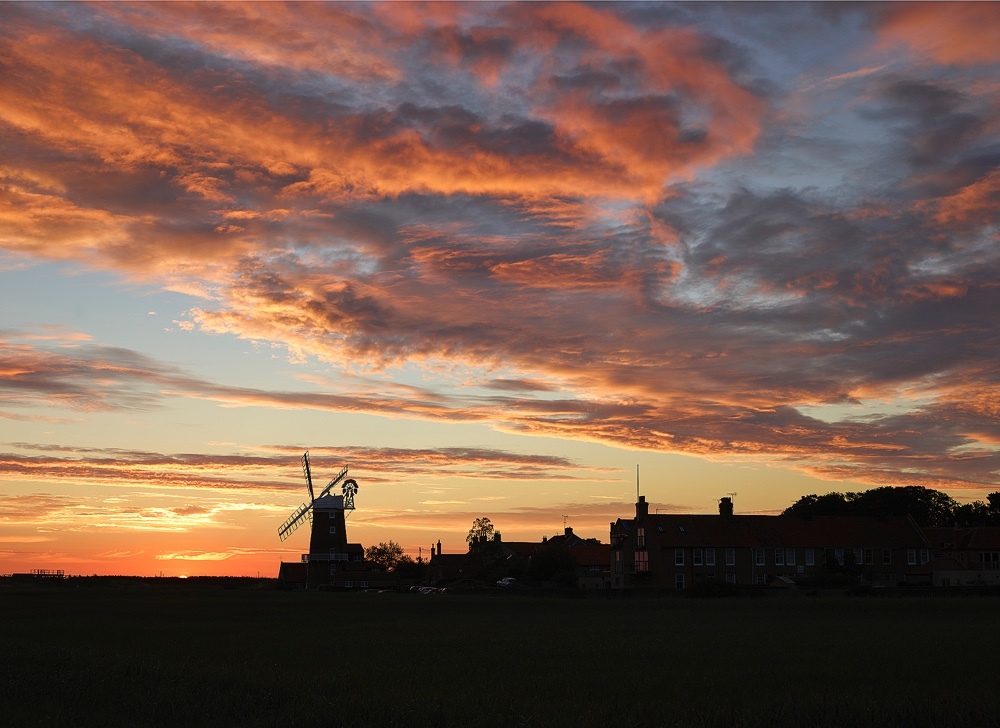Limited edition photograph along the North Norfolk coastline titled “Sunrise - Cley Mill”