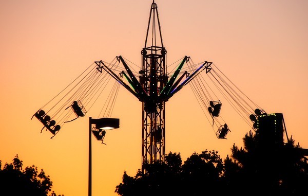 Swings at Sunset - Architecture and Night Skyline