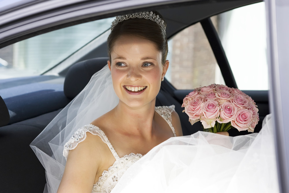Bride in Wedding car at Caerphilly Castle - Wedding Photography at Caerphilly Castle