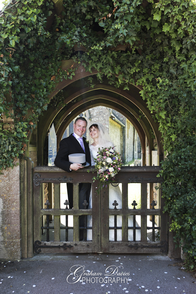 Bride & Groom at Gate at Wedding at St. Hilary - Wedding Photography at St. Hilary