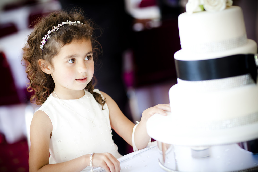 Flower Girl and Wedding Cake at Margam Orangery - Wedding Photography at Margam Orangery