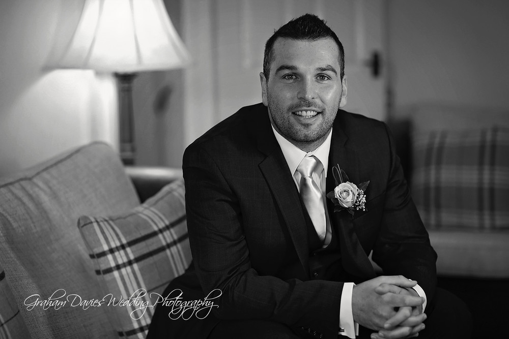 Miskin Manor groom getting ready b&w - Wedding Photography at Miskin Manor