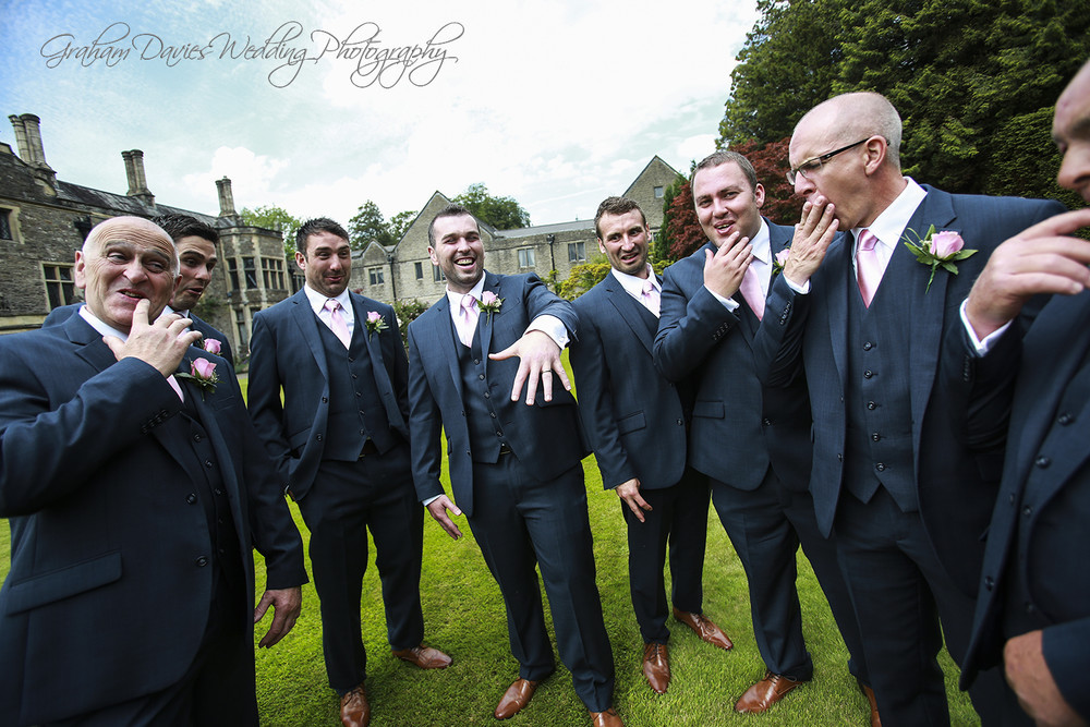 Miskin Manor Groom fun shot with ring - Wedding Photography at Miskin Manor