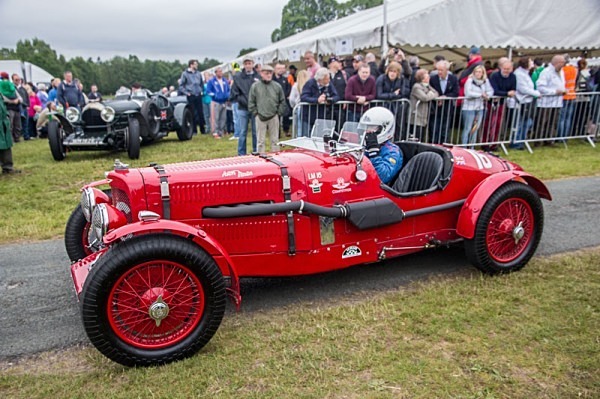 The Cholmondeley Pageant of Power  Cholmondeley vulcan bomber Pageant of Power  gothic castle  formal garden red bull