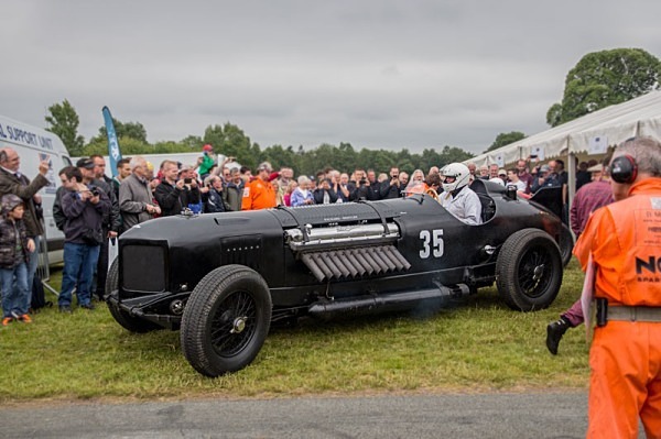 The Cholmondeley Pageant of Power  Cholmondeley vulcan bomber Pageant of Power  gothic castle  formal garden red bull