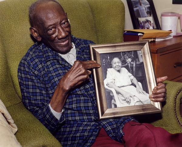 Reverend H.D. Dennis Holding Portrait of Margaret, Mississippi, 2011 - The True Gospel Preached Here