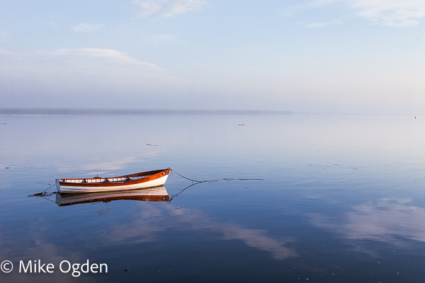 Boat on a calm River Tay - River Tay